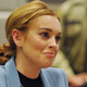 Image for article titled In an Effort to Look Miserable, Anne Hathaway Chops Off Her Long, Luscious Locks